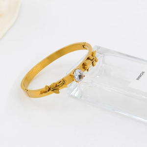 18K gold plated stainless steel open bangle featuring rose flower design and crystal