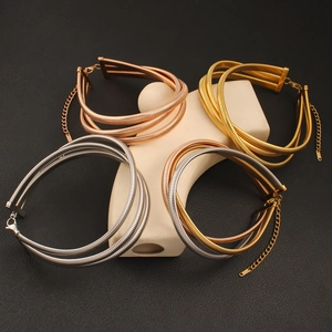 Minimalist multi-layered stainless steel choker necklace in gold, silver, and rose gold
