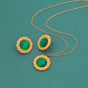 Vintage green gemstone jewelry set with gold braided texture necklace and earrings