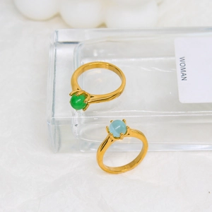 Minimalist 18K gold plated stainless steel rings featuring green and blue gemstones