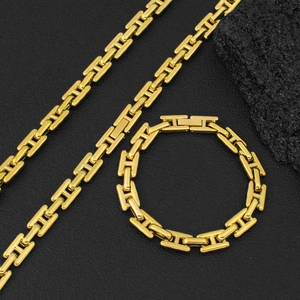 Conjunto de collar y pulsera de acero de titanio dorado con eslabones tipo H