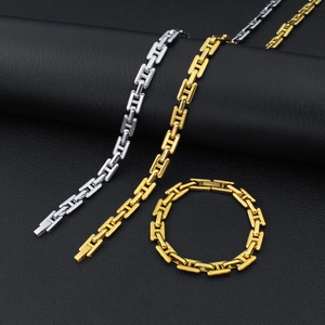 Conjunto de collar y pulsera de eslabones en H pulidos en oro y plata de lujo