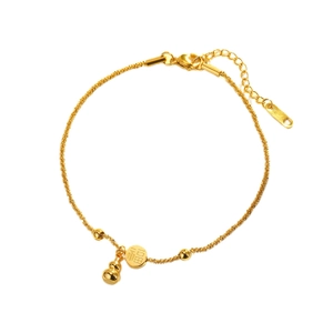 Golden titanium steel anklet with lucky Fu character and gourd charm on white background
