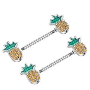 Makroaufnahme von Ananas-Brustpiercings mit gelben Kristallen und grünen Emaille-Blättern
