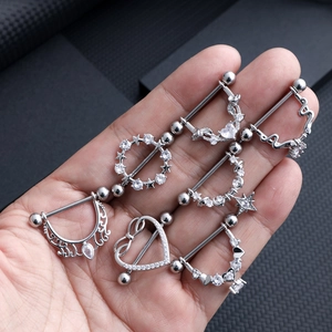 Set of 7 silver stainless steel nipple rings with heart and star zircon designs