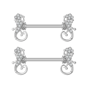 Close-up of silver gecko body jewelry set with sparkling zircon stones on white background