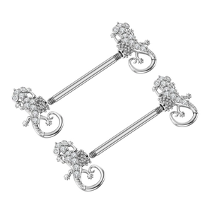 Macro view of gecko nipple barbells with clear zircons and polished silver finish