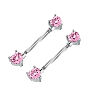 Detail of surgical steel nipple rings featuring pink heart-shaped cubic zirconia stones