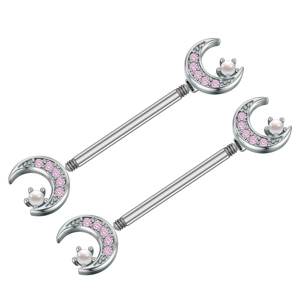 Detailed macro view of pink zircon moon nipple rings with central white pearl accents