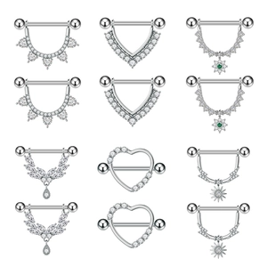Set of stainless steel nipple rings with green and white cubic zirconia crystals