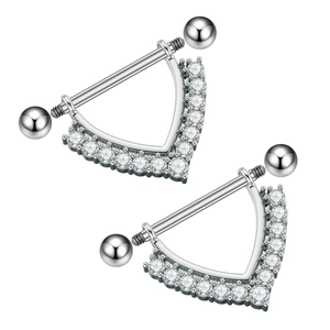 Detail of silver nipple rings with V-shape zircon stones and polished surgical steel