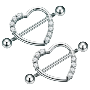 Detail shot of heart-shaped nipple rings with sparkling zircon inlay and steel barbell
