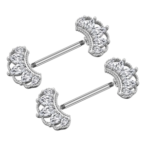 Macro shot of stainless steel nipple rings with marquise zirconia gems and screw thread detail