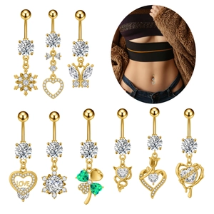 Golden belly button ring set with butterfly, heart, and clover pendants featuring sparkling zircons