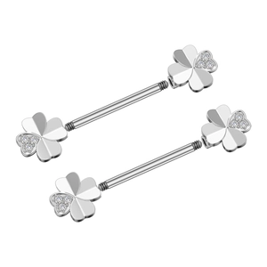 Macro detail of stainless steel nipple rings with clover zircon inlay and threaded bars