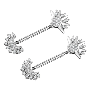Detailed macro view of silver nipple barbells with star and moon zircon inlay design
