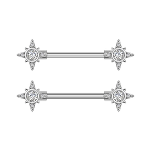 Detail of silver nipple rings featuring starburst designs with micro-pave cubic zirconia