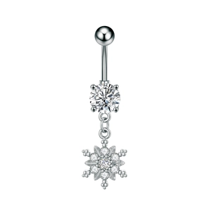 Detail of snowflake belly piercing with sparkling zircon stones in silver surgical steel