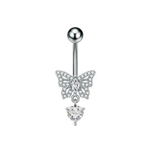 Macro detail of butterfly belly ring with sparkling heart-shaped zircon crystal pendant