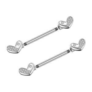 Macro detail of heart-shaped nipple rings with micro-set zircons and threaded rods