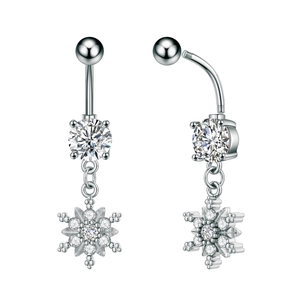 Macro view showing silver snowflake belly ring details with sparkling zircon inlays
