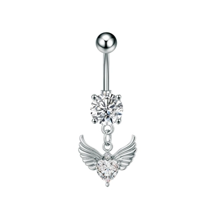 Detailed close-up of heart-shaped zircon belly ring with angel wings and silver curved bar