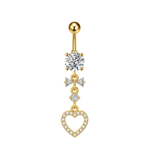Detail of golden butterfly belly ring with heart pendant and sparkling zircon stones