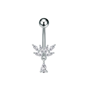 Macro detail of silver navel ring featuring sparkling teardrop and marquise zircons