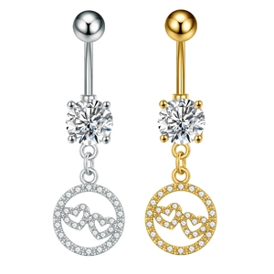 Detailed macro view of heart belly button rings with sparkling cubic zirconia insets