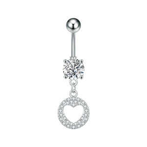 Macro shot of silver navel ring with zircon main stone and hollow heart pavé pendant
