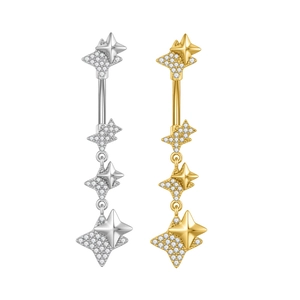 Detailansicht von Stern-Bauchnabelpiercings in Silber und Gold mit Zirkon-Besatz