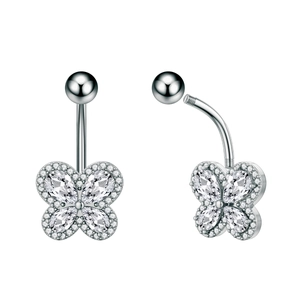 Macro view of silver butterfly belly ring with pear-cut zircon stones and screw-ball closure