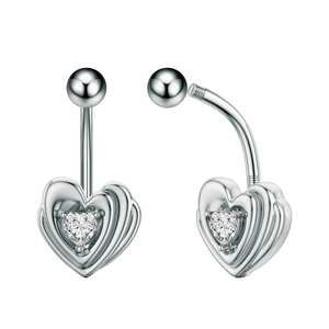 Detail view of heart-shaped zircon belly ring with polished silver curved barbell