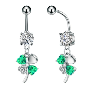 Detailed view of silver belly ring with green heart clover pendant and zircon inlay