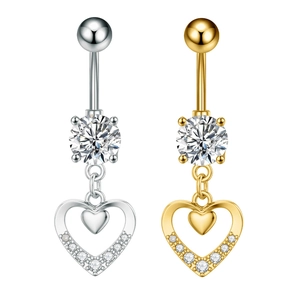 Detailed close-up of double heart navel rings with sparkling crystals in gold and silver