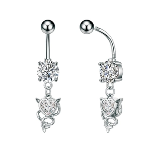Detailed close-up of a butterfly belly ring with sparkling zircon stones and a heart pendant