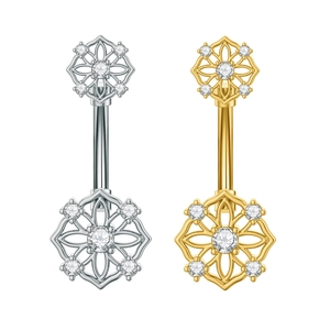 Close-up of heart-shaped belly rings with intricate floral zircon inlay in gold and silver