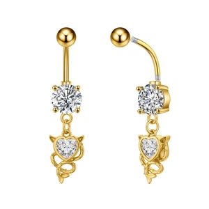 Detail of butterfly navel ring with heart-shaped zircon and devil wing pendant design