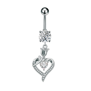 Macro view of silver heart navel ring featuring sparkling zircon and tulip flower detail