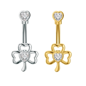 Detailed close-up of gold and silver heart-shaped belly rings with clover and zircon