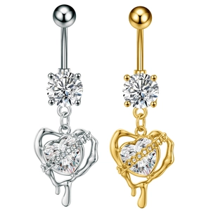 Detail of silver and gold butterfly belly rings with dangling heart-shaped zircons
