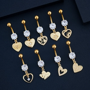 Set de 9 piercings para el ombligo en oro y acero con colgantes de corazón y circón