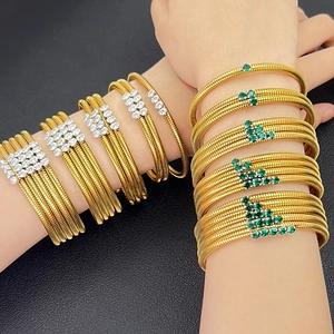 Layered 18K gold plated stainless steel spiral bracelets with white and green zircon