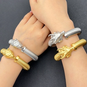 Pulseras de acero inoxidable con cabeza de leopardo en color dorado y plateado con resorte