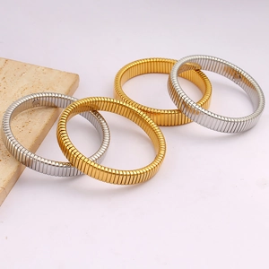 Fashionable gold and silver stainless steel Tubogas flexible bracelets on stone