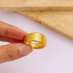 Minimalist gold plated textured stripe ring with a vintage geometric wide band design