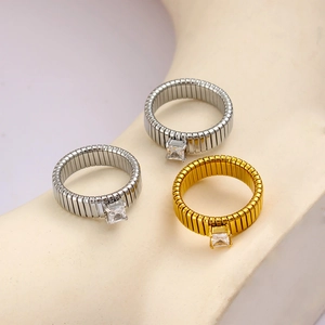Detail view of elastic 18K gold plated square zircon rings with flexible chain band