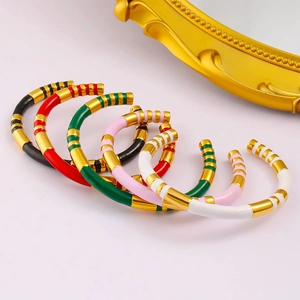 Bamboo-style C-shaped enamel bangles in 18K gold-plated stainless steel for women