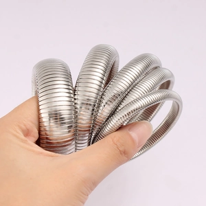 Flexible stainless steel spring coil bracelet with silver glossy snake chain texture