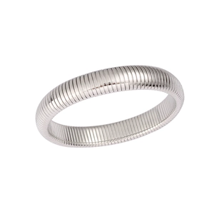 Detailed close-up of flexible Tubogas stainless steel silver bangle with ribbed texture